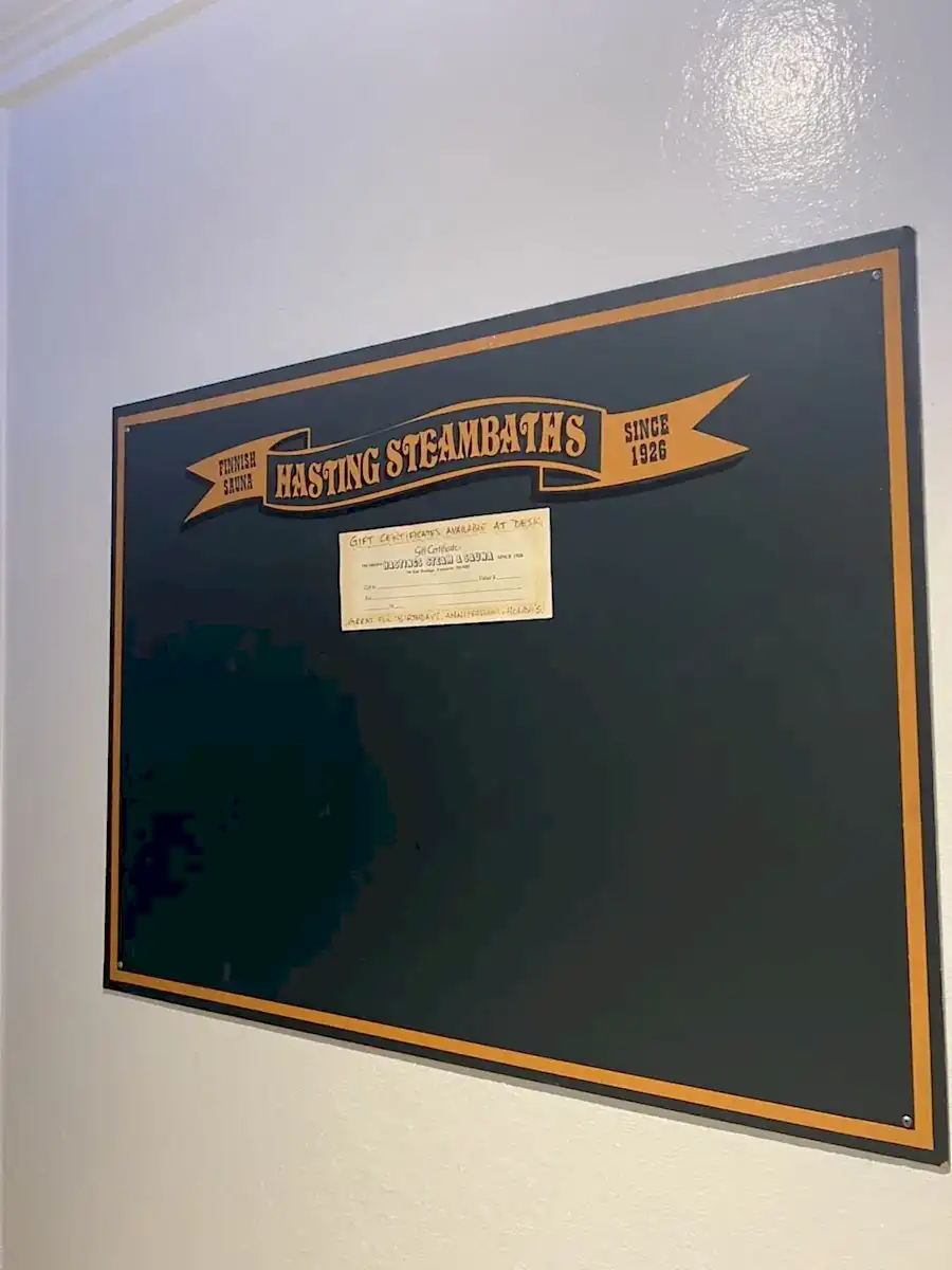 Original Hasting Steambaths chalkboard sign since 1926